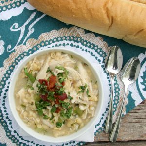 Throw together is quick Chicken and Corn Soup using leftover chicken for a simple, yet hearty weeknight supper.