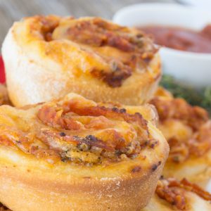 Pizza Muffins are everything you love about pizza rolled up and baked in a muffin tin for a portable lunch or snack!