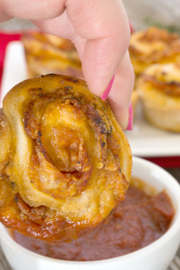 Pizza Muffins are everything you love about pizza rolled up and baked in a muffin tin for a portable lunch or snack!