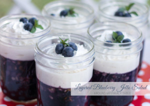 layered blueberry jello salad in mason jars