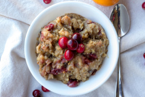 bowl of orange cranberry oatmeal, made in a slow cooker