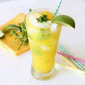 These Mango Mint Mojitos are a refreshing blend of mango, mint, lime, and rum.