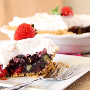 Once you discover how easy no-bake pies are...it's hard not to come up with new creations. This NO-BAKE TRIPLE BERRY PIE has a pretzel crust and is ready after a couple hours in the fridge.