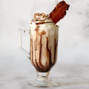 This Chocolate Caramel Bacon Milkshake is one of the most decadent milkshakes ever. It's sweet, salty, chocolatey, and total perfection.