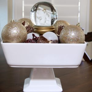 A simple Christmas Centerpiece is all you need for your table to add a little holiday cheer to your dining room.