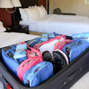 Family travel doesn't have to be hectic. I can pack my family of 4 quickly and keep us organized on the road. Check out these Simple Organized Luggage Tips and a bonus travel packing list.