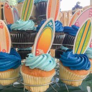 Surf's Up Birthday Party...simple and fun surfing party ideas! Love these easy surfboard cupcakes.