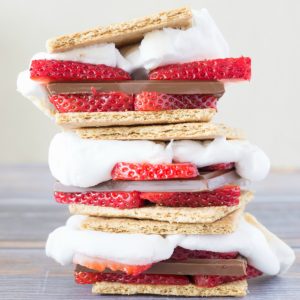 These Chocolate Covered Strawberry S'mores are everything you love about chocolate covered strawberries and everything you love about S'mores combined into one ultimate summertime dessert.