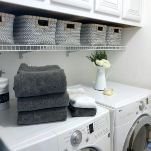 Learn how to simplify laundry day and organize your laundry area. I have several manageable solutions for your next laundry day. You'll love my Simplified Laundry System for Busy Families that includes a free Laundry Stain Removal Guide printable.