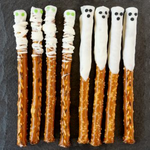 Ghost & Mummy Halloween Pretzels are salty, sweet, and make a creepy-cute surprise for friends and trick-or-treaters alike.