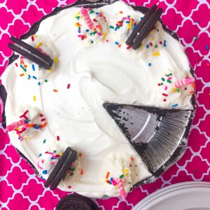 Ice Cream Pie on a white plate and pink cloth