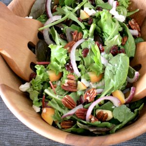 Salad in wooden bowl