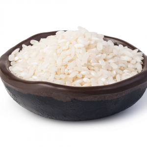 cooked arborio rice in wood bowl